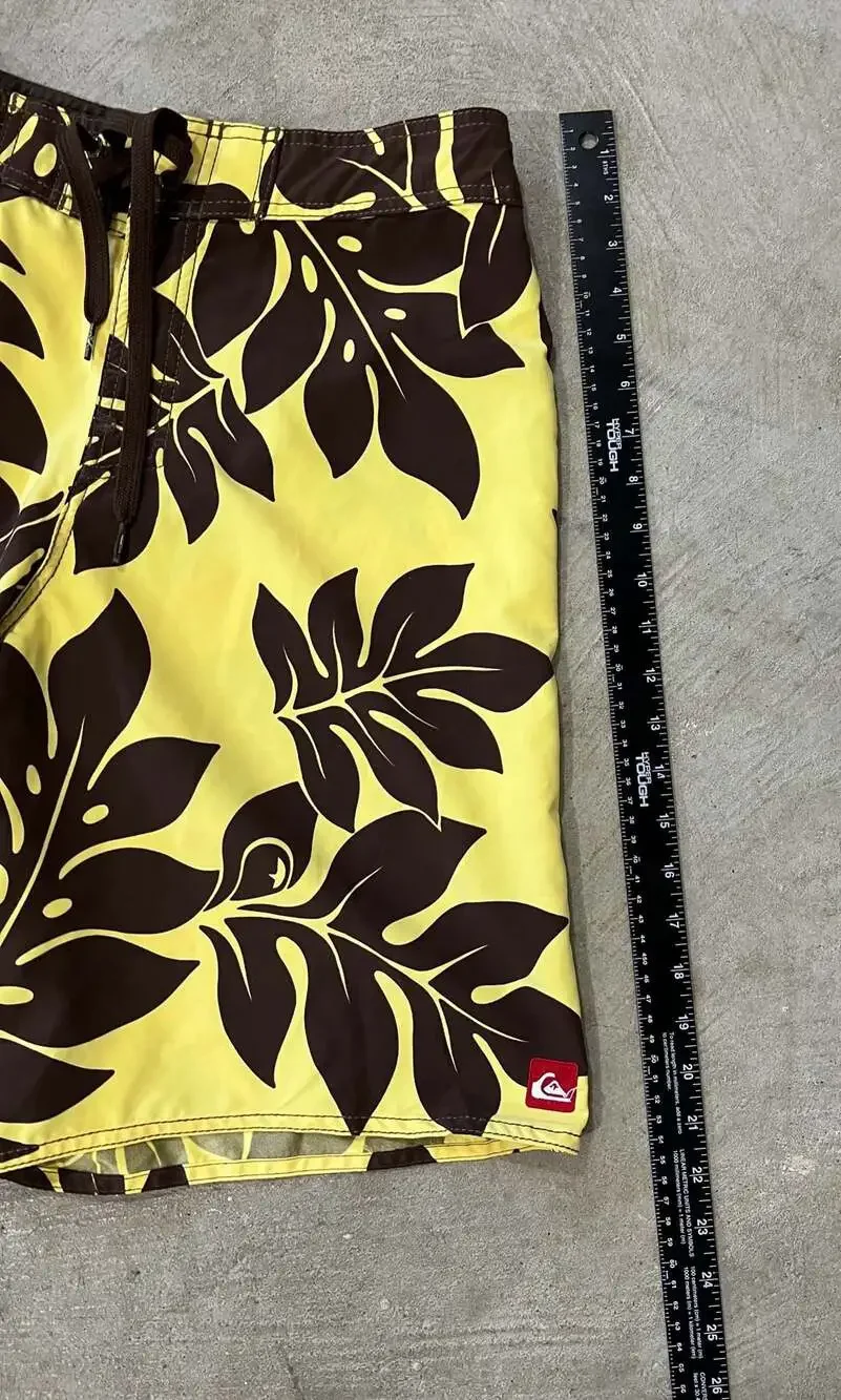 Y2K vintage Quiksilver Men's yellow Hawaiian Boardriding Floral Board Shorts 32”